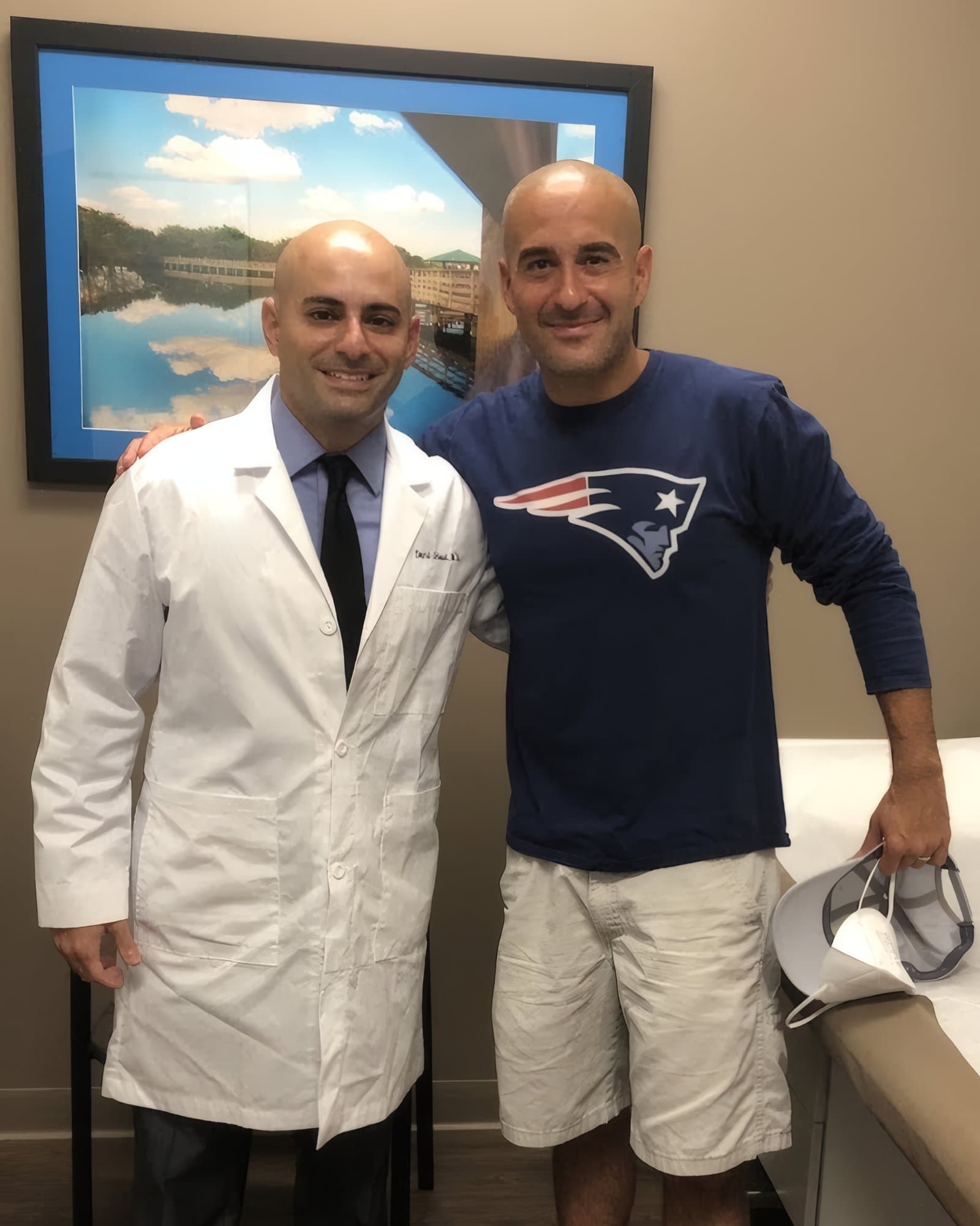 Dr. Abbasi with Jon Anik, the UFC's play-by-play commentator