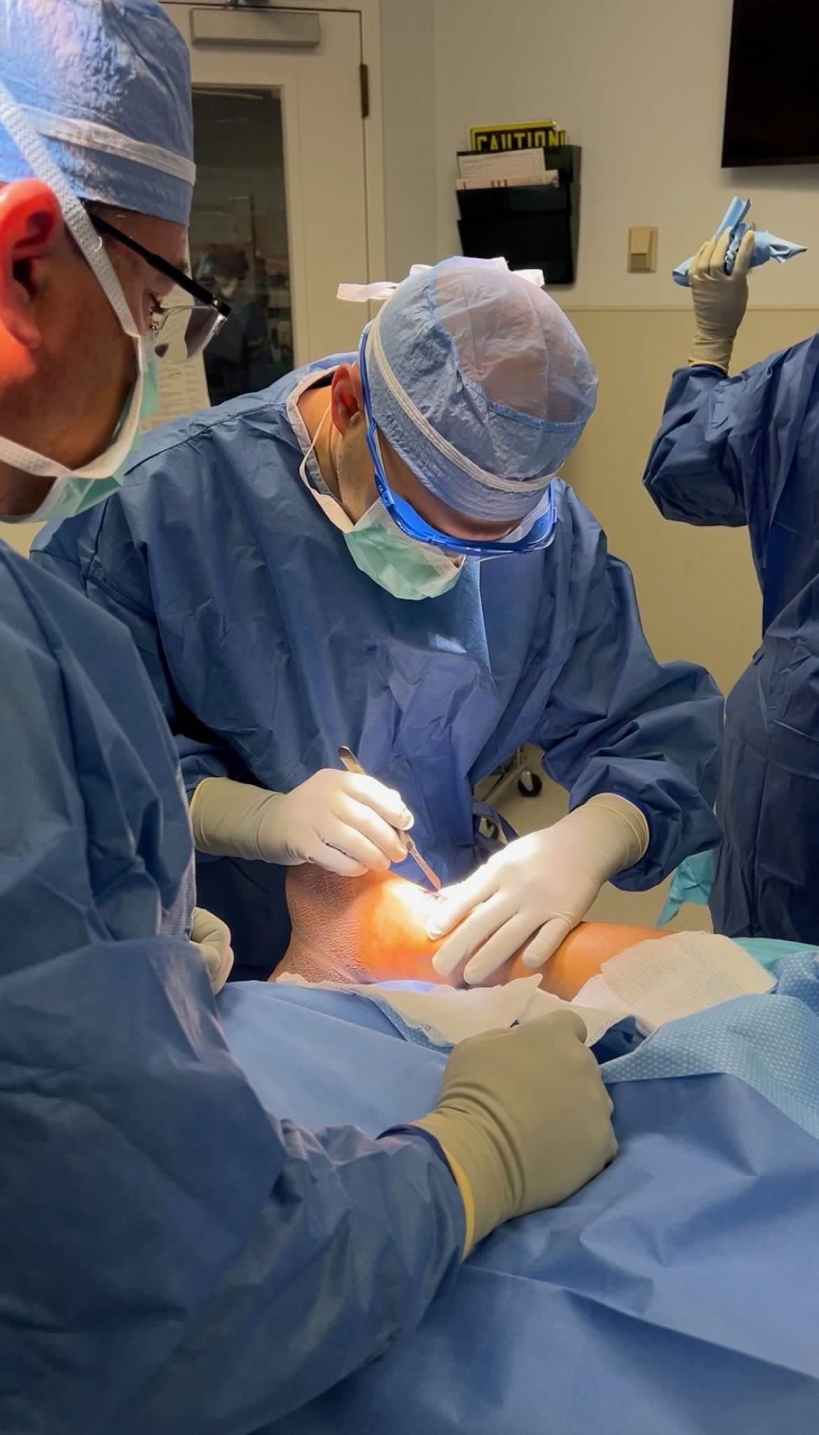 Dr. Abbasi performing orthopedic surgery