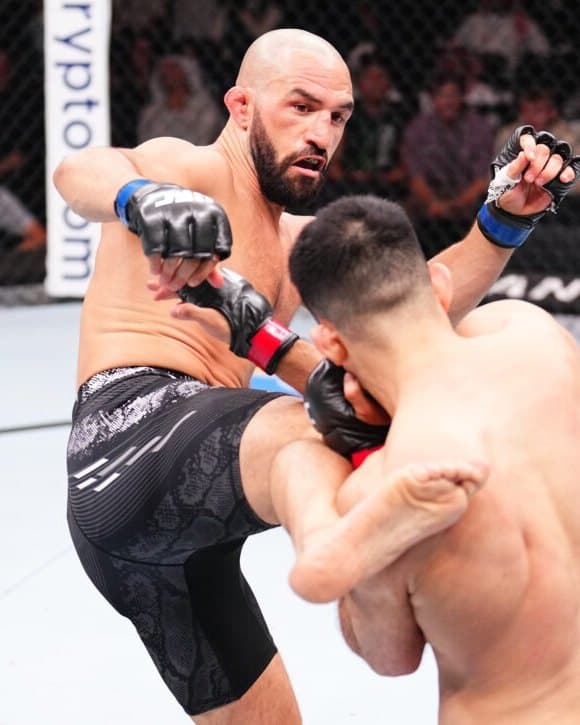 Jared Gordon fighting in the UFC octagon