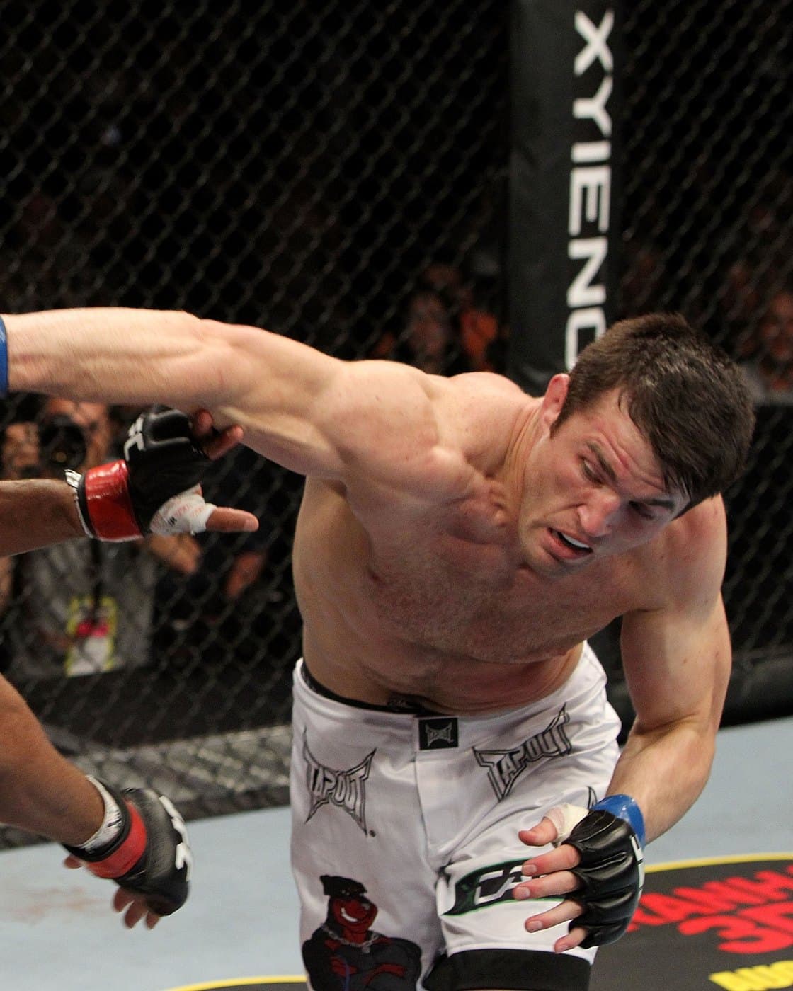 Chael Sonnen throwing a punch in the UFC octagon