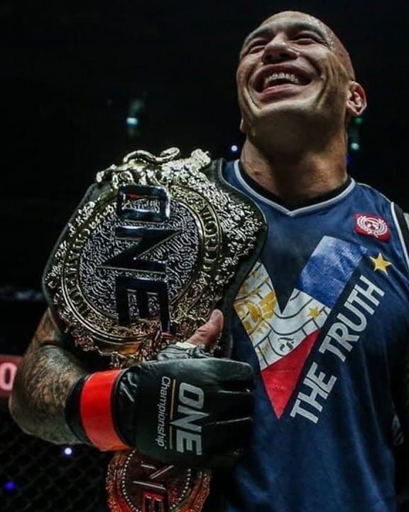 Brandon Vera holding the ONE heavyweight world championship belt