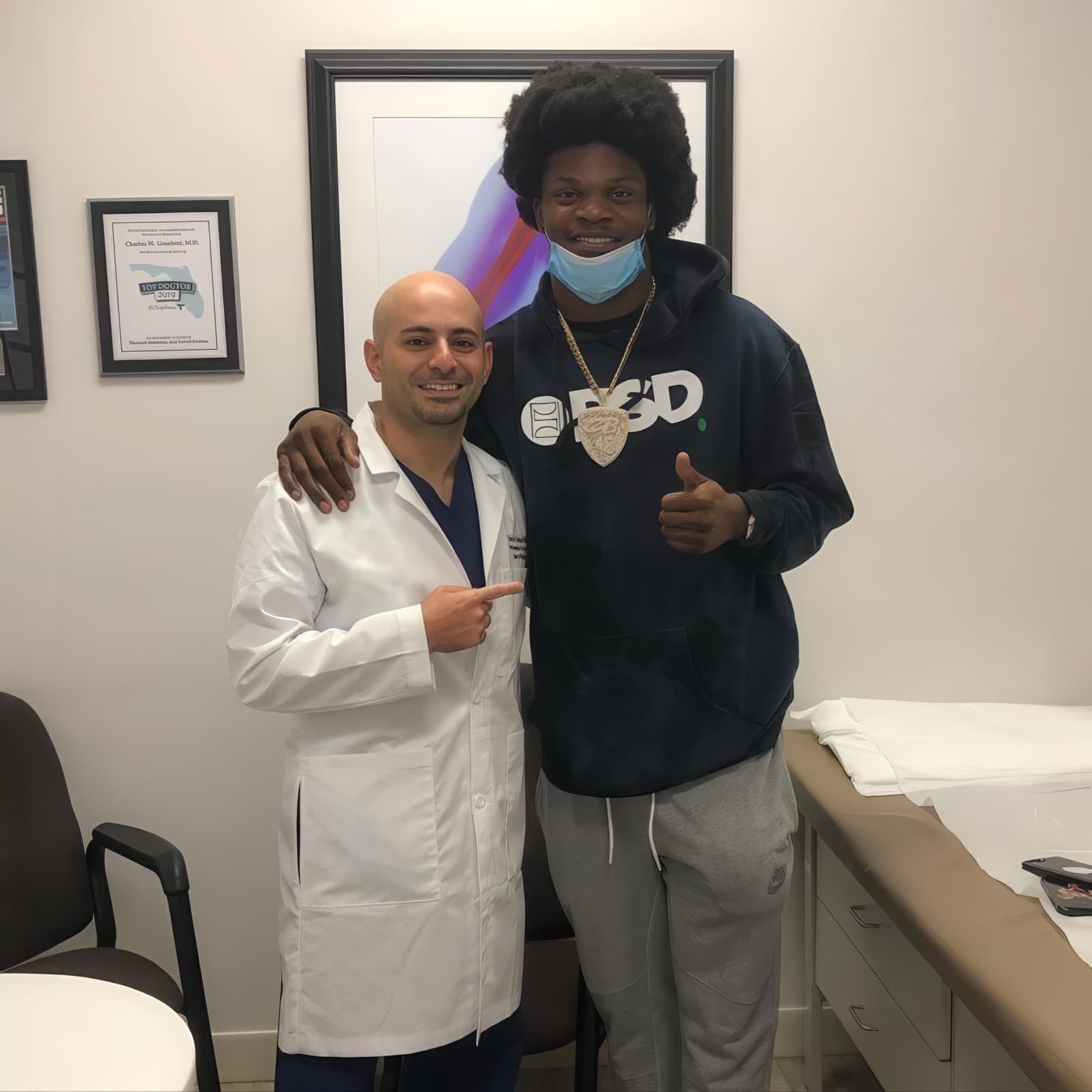 Dr. Abbasi with Lamar Jackson, Baltimore Ravens quarterback